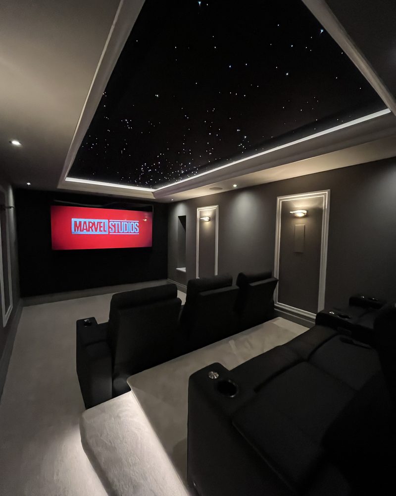 Sonor home cinema installation with star ceiling, cinema seating and surround sound
